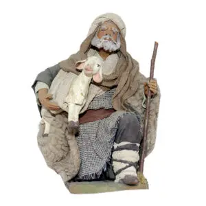 Uomo in Ginocchio Pecora sotto Braccio