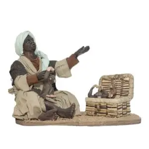 Moro Seduto a Terra con Scimmie