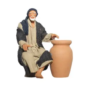 Uomo seduto accanto alla anfora