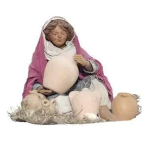 Araba seduta per terra con anfore