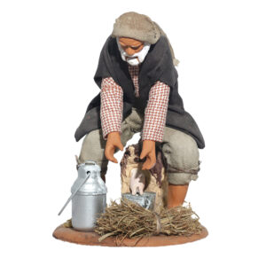 Uomo che Munge Capra