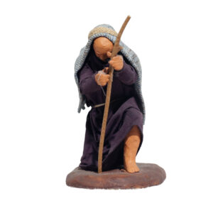 Uomo In Ginocchio Con Capo Chinato