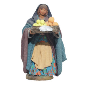 Donna Cesto Frutta In Mano