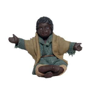 Fanciullo Moro seduto per Terra