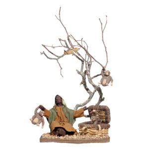 Moro Seduto per Terra con Scimmie