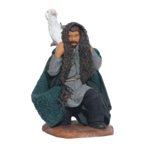 Uomo In Ginocchio Con Pecora Spalle