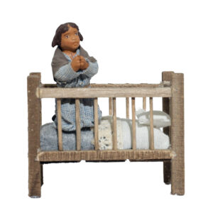 Fanciulla che Prega nella Culla