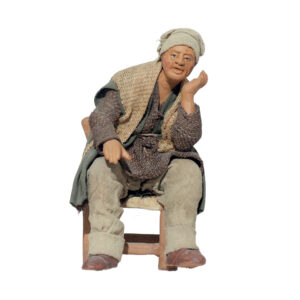 Uomo Seduto Che Pensa Mano Sotto Al Mento