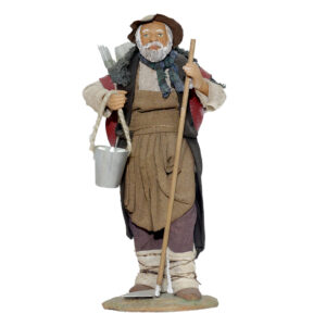 Uomo con Attrezzi Agricoli