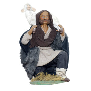 Uomo in ginocchio pecora spalle