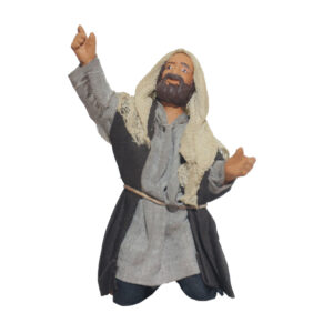 Uomo In Ginocchio Che Indica