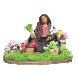 Fioraia Seduta Per Terra