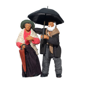 Coppia di anziani con ombrello